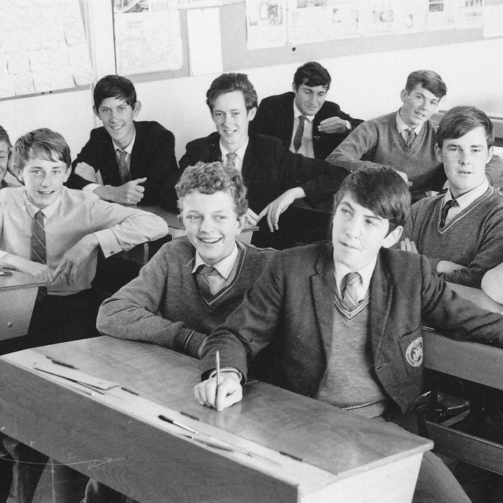 Historical image of St Patrick's Marist College Dundas students sitting at desk